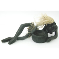 Wooden figurine "Lying Papuan" ashtray (20 cm) (Indonesia)