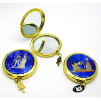 Cosmetic mirror in gold case 