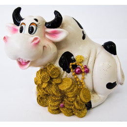 Корова на монетах копилка