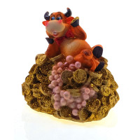 Cow on a pile of money (10x10x9 cm)A