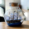Model of a sailboat in a bottle (11x10x10 cm)