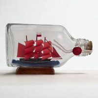 Sailboat model in a bottle (13 x 8 x 3 cm)