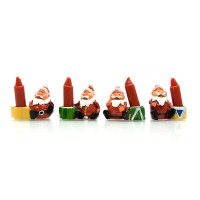Santa Claus with a candle (4x4.5x2 cm)