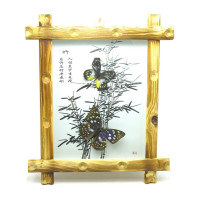 Butterflies in a wooden frame on the background (34x29x4 pcs)
