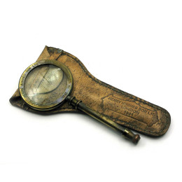 Bronze magnifier in a leather case (23x12x2 cm)