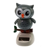 Owl dancing on a solar battery gray (Flip Flap) (10.5x6x6 cm)